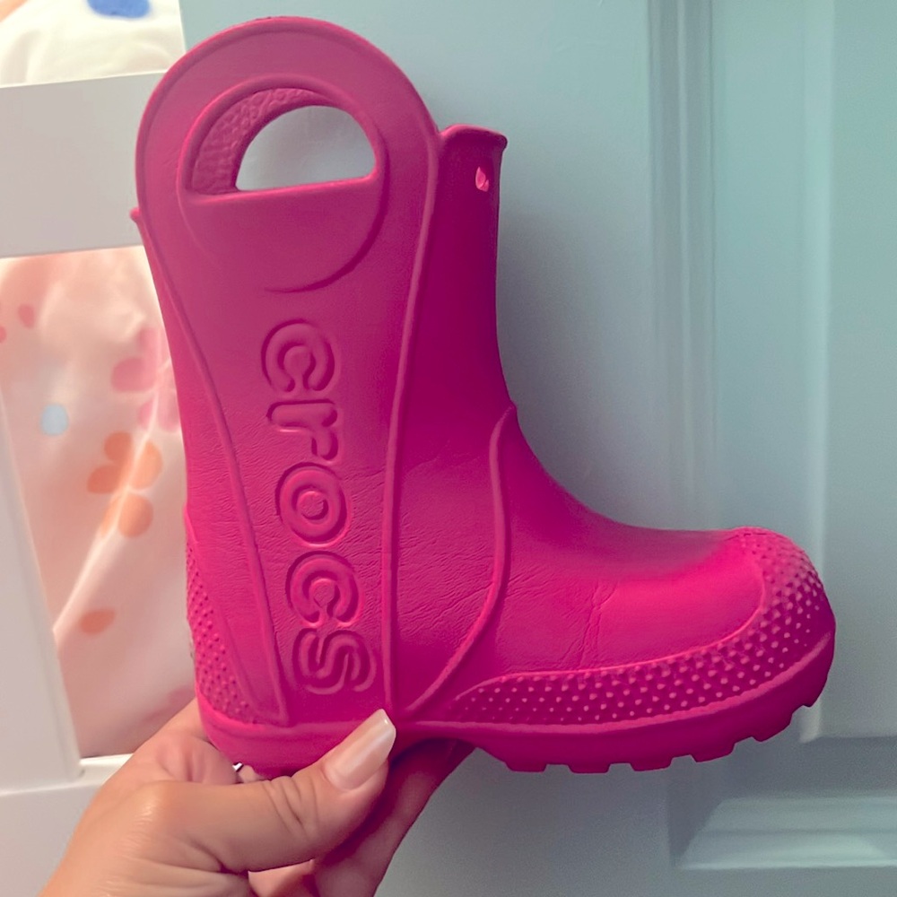 Crocs rain boots, size c7, hot pink in color, Almost new!